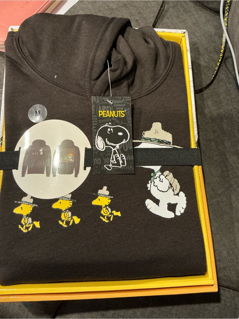 Peanuts Black Hoodie with Yellow Woodstock Graphics
